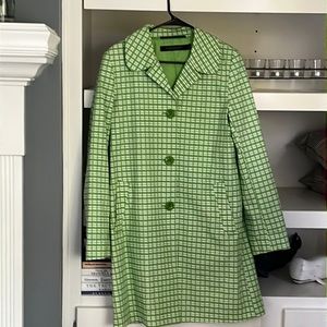 Green and white London Fog rain coat